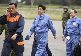 PM Abe takes helicopter tour over typhoon-damaged area