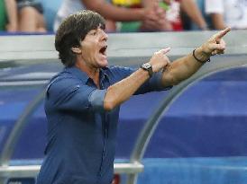 Soccer: Low picks up 100th win as Germany coach