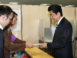 PM Abe casts absentee vote