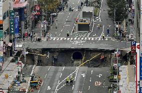 Huge sinkhole disrupts traffic in central Fukuoka