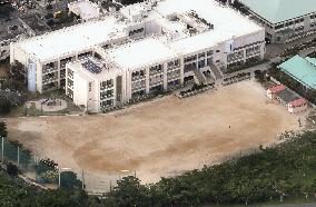 Window falls from U.S. chopper onto Okinawa school grounds