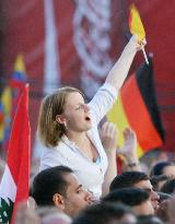 Supporters take part in 'soccer fan' party