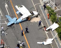 Light plane crashes onto nat'l highway in Osaka Pref.