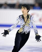 Japan's Hanyu defends Grand Prix Final figure skating title