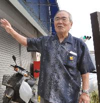 Okinawan feels betrayed by gov't over return to Japan in 1960s