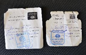 Islamic State pass permits seized