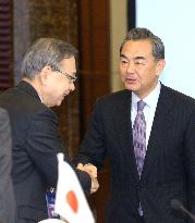 FM Wang greets Japan's ex-envoy Miyamoto in Beijing
