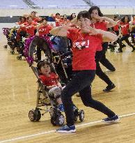 Japanese moms' "stroller dance" gives life to child-rearing