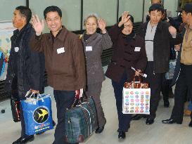 10 Chinese return home from search for Japan kin