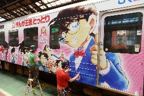 JR West train wrapped with "Case Closed" characters
