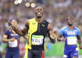 Olympics: Bolt claims third consecutive win in men's 100m