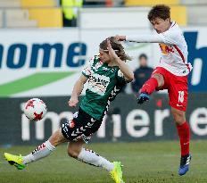 Soccer: Minamino grabs hat-trick to power Salzburg past Ried