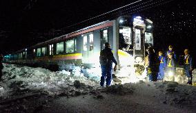 Passengers trapped as snow strands train in Japan