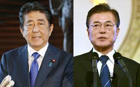 Japan PM Abe, S. Korea Pres. Moon