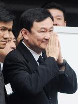 Ousted Thai premier Thaksin returns home to face corruption char