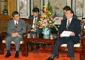 Kono meets with Tang in Beijing