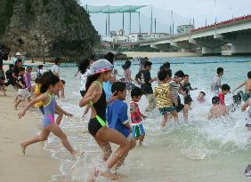 Okinawa beach opens for summer tourism season