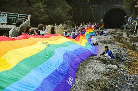 100-meter-long rainbow flag on 8th-month tsunami anniv.