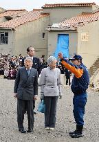 Emperor, empress visit Hiroshima landslide site