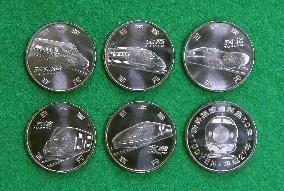 Japan Mint displays 50th anniv. of Shinkansen coins