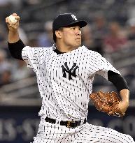 Tanaka pitches against Orioles