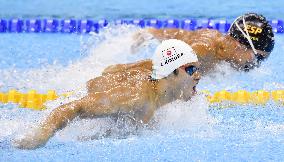 Japan's Kimura wins silver in men's 100-meter butterfly