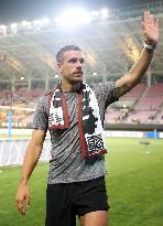 Soccer: Podolski debuts for Vissel Kobe in friendly