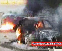 (1)Iraqi militants show firefight scene on web video