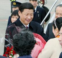 China's Vice President Xi arrives in Japan