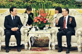 Japan PM Noda, China top legislator Wu