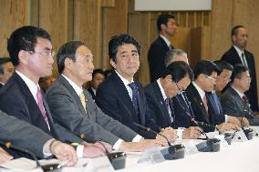 Japan retains Nov. economic assessment but lowers view on investment