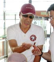 Hon Hai chairman leaves Japan after takeover deal with Sharp