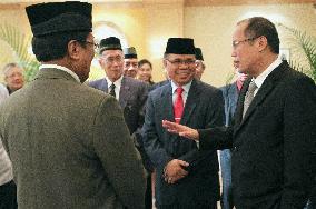 Philippine president, Muslim rebel chief meet secretly in Japan