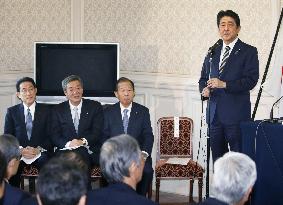 Abe re-elected as Japan PM after election victory