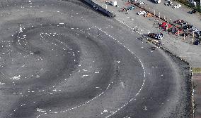 Car plows into spectators at drift event in southwest Japan