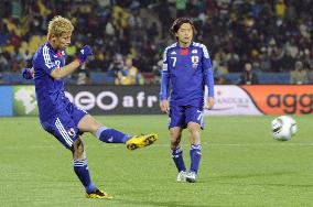 Japan overpower Denmark to cruise into last 16