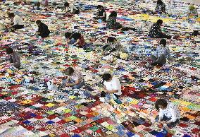 Disaster-affected people create Guinness-recognized blanket