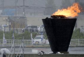 1964 Olympic cauldron lit in tsunami-hit Ishinomaki