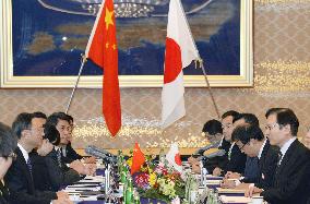 China's top diplomat Yang meets Abe aide Yachi to promote dialogue