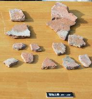 Earthenware fragments from 9th-century salt-making facility