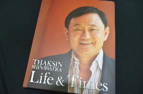 Fugitive former Thai PM sends photo book to foreign media