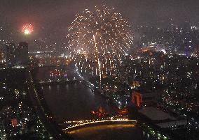 Sumida River Fireworks Festival lights up rainy Tokyo night