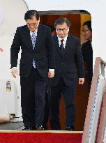 S. Korean envoys return home from N. Korea