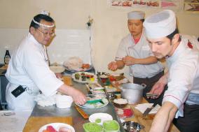 Japanese sushi chefs perform sushi making in Moscow