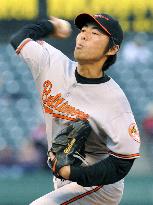 Orioles' Uehara earns 2nd win