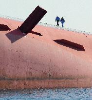 Overturned Japanese ferry inspected