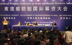 Donors at Beijing bird flu funding conference pledge $1.9 bil.