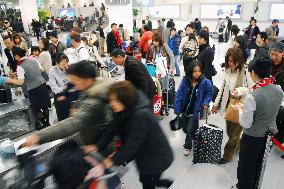 Rush of returning travelers peaking