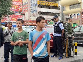 Police on alert near Urumqi bazaar