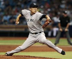 Tanaka delivers with 7 scoreless innings